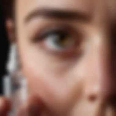 A person reading a label on an eye drop bottle