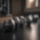 A compact set of dumbbells arranged neatly on a gym floor