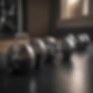 A compact set of dumbbells arranged neatly on a gym floor