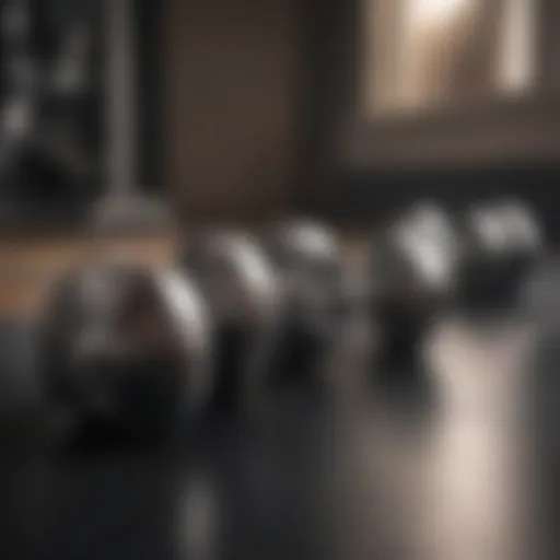 A compact set of dumbbells arranged neatly on a gym floor