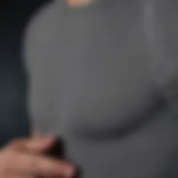 A close-up of a compression shirt demonstrating its fabric and fit