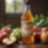 A close-up of apple cider vinegar in a glass bottle surrounded by fresh apples