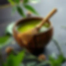 A vibrant bowl of matcha tea with a bamboo whisk