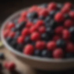 A vibrant bowl of mixed berries with a sprinkle of seeds