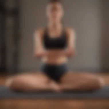 A person performing wrist flexibility exercises on a yoga mat